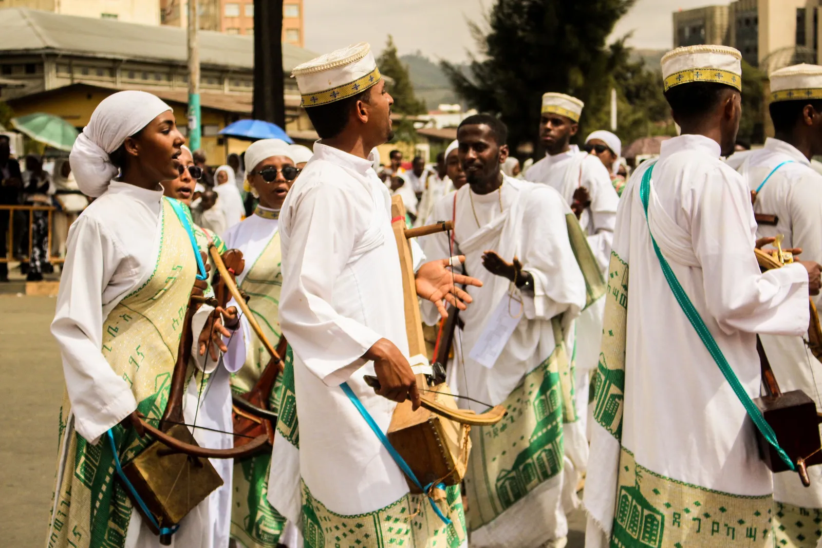 African group celebrates Meskel festival in Addis Ababa with traditional attire and dance.